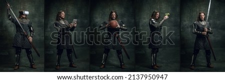 Performance. Vintage portrait of seriuos man, medieval warrior or knight with wounded face holding sword, tablet, ball isolated over dark background. Comparison of eras, history, renaissance style