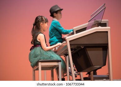 Performed At The Recital Of The Piano