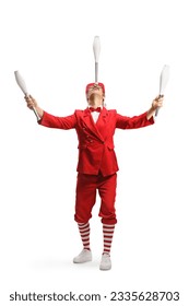 Performer in a red suit holding juggling clubs with head isolated on white background - Shutterstock ID 2335628703