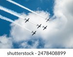 Performing Fighter Planes Flying in Formation