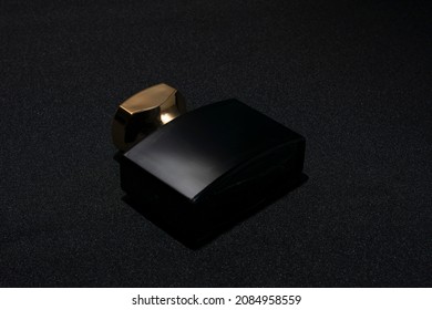 Perfume Bottle. Mockup On Dark Or Black Empty Background. Fragrance For Man Or Woman. Top View. Horizontal Photo With Copy Space