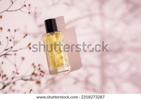 perfume bottle mockup with pink background