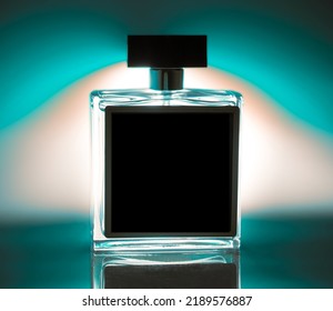 Perfume Bottle With Place For Text. Black Color On A Light Blue Background. Spray. Modern Luxury Parfum De Toilette.