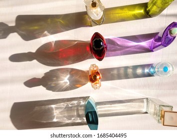 Perfume Bottles Cast Colored Shadows