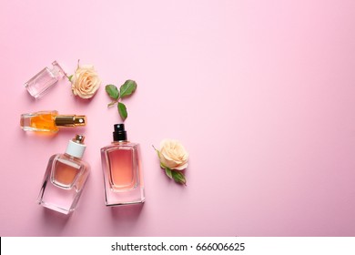 Perfume Bottles On Pink Background, Top View