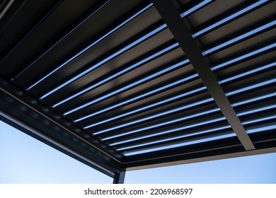 Pergola awning in the sunshine photo - Shutterstock ID 2206968597