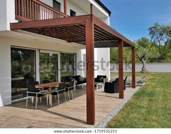 Pergola and\
terrace of modern prefabricated\
house