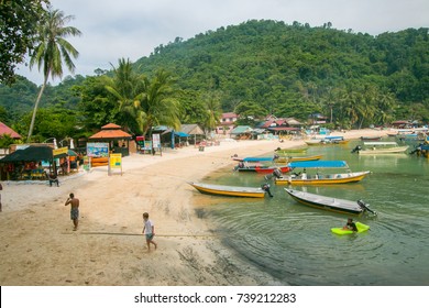 PERHENTIAN ISLAND, MALAYSIA, 21 OCTOBER 2017 - View of small Perhentian Island with multiple boats. Perhentian Island is the most favourite holiday destination among locals and tourists.