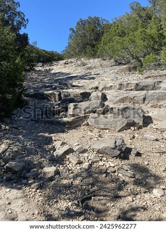 The perilous clime up the mountain path