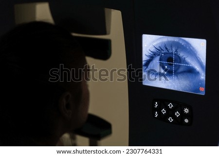 Perimetry visual field test for measure all areas of eyesight, including side, or peripheral vision. Perimetry eyes test for early sign of glaucoma of woman patient of ophthalmology clinic