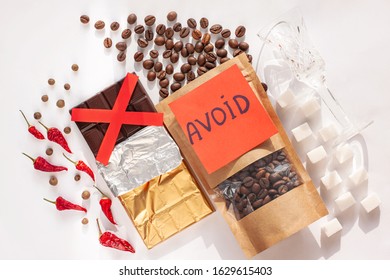 Period Diet Concept. Foods To Avoid During Menstruation Bleeding Flat Lay. Products Worsen Symptoms Of Feminine Critical Days Stomach Pain. Coffee, Caffeine Drinks, Dark Chocolate, Spices, Sugar, Salt