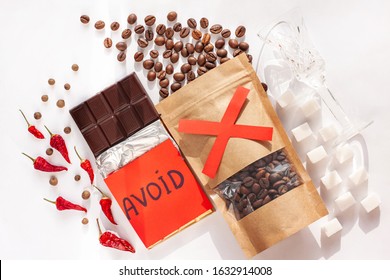 Period Diet Concept. Foods To Avoid During Menstruation Bleeding Flat Lay. Products Worsen Symptoms Of Feminine Critical Days Stomach Pain. Coffee, Caffeine Drinks, Dark Chocolate, Spices, Sugar, Salt