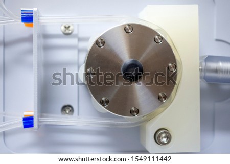 Peristaltic pump with plastic tubes. Without rollers moving.
