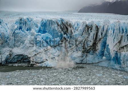 Perito Moreno Dramatic view of a glacier calving ice into cold arctic waters during a global warming event
