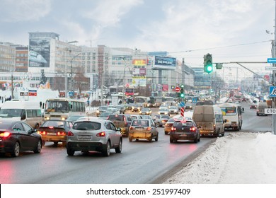 PERM, RUSSIA - JAN 11, 2014: Cars Going On Street. In Perm Region Of About 1 Million Cars