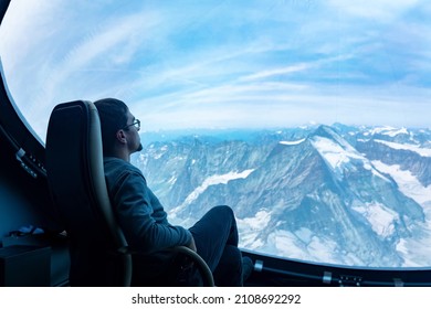 Perm, Russia - January 13, 2022: Man Watching Educational Fulldome Movie