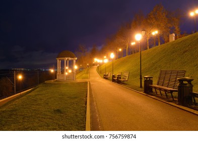 Perm russia, rotunda and benches on pavement in light lantern at night - Shutterstock ID 756759874