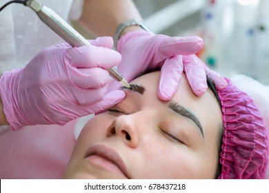 Permanent Makeup Procedure. Eyebrow Make Up. Brow Tattoo. Close Up, Selective Focus.