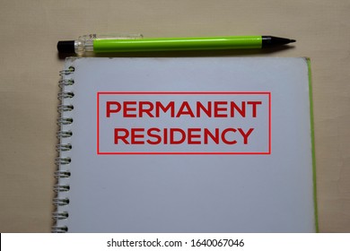 Permanent Residency Write On A Book Isolated On Office Desk