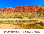Permanent waterhole of Glen Helen Gorge in West MacDonnell Ranges, Northern Territory in Australian Outback along Red Centre Way.