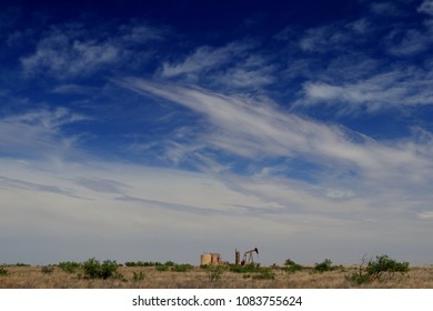 Permian Basin Oil Production, Texas Sky And Pump Jack In Color