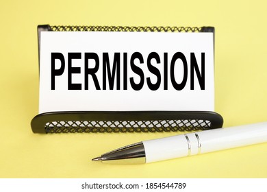 PERMISSION, text on white paper on YELLOW background - Shutterstock ID 1854544789