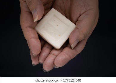 Perosna Washing Her Hands With Bar Soap