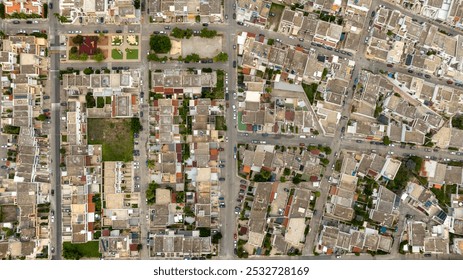 Perpendicular aerial view of houses, apartments and buildings in San Foca in the province of Lecce, Salento, Puglia, Italy. - Powered by Shutterstock