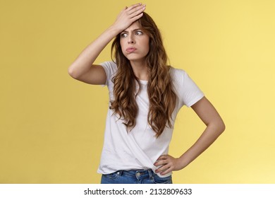 Perplexed tired troubled girl have lots work feel pressured distressed breath out sighing difficult task piles documents hardoworking, punch forehead look away intense exhausted - Shutterstock ID 2132809633