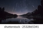 Perseids meteor Shower and the Milky Way silhouette in the foreground. Perseid Meteor Shower observation. Night sky nature summer landscape. Colorful shooting stars