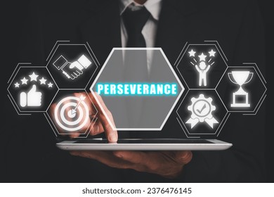 Perseverance concept, Businessman using digital tablet with perseverance icon on virtual screen. - Shutterstock ID 2376476145