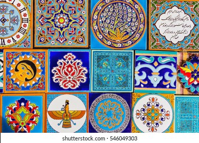 Persian Islamic Motifs, Designs And Patterns Painted On Handmade Colorful Blue And Green Tiles From Isfahan, Iran.