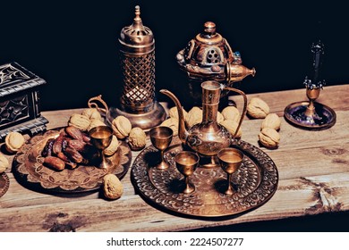 Persian Tea And Teapots Pouring Hot Tea In Tea Cups At A Table.