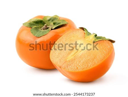Persimmon fruit with cut in half isolated on white background. Clipping path.