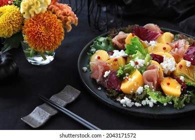 Persimmon And Prosciutto Ham Autumn Appetizer Salad For Halloween Or Thanksgiving.