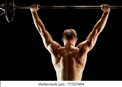 Persistent Man Lifting A Barbell. Building A Perfect Body, Lifting Heavy Weight Concept. One More Rep.