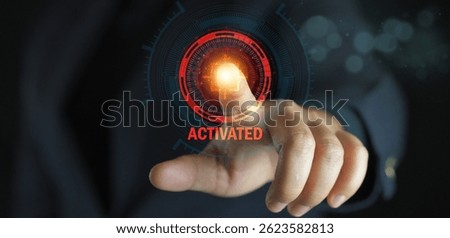 A person activates technology interface. A close-up shot captures a finger pressing a virtual button. Digital interaction represents a powerful concept.