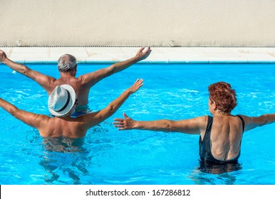 person aged group doing water aerobics in a swimming pool during a spa treatment
 - Powered by Shutterstock