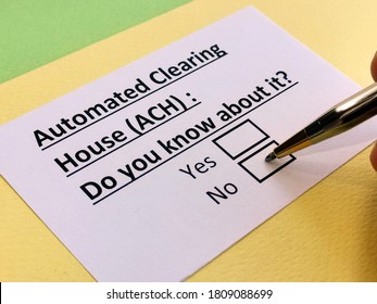 A person is answering question about automated clearing house. - Shutterstock ID 1809088699