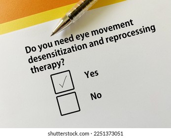 A person is answering question about counseling and therapy. She needs eye movement desensitization and reprocessing therapy. - Shutterstock ID 2251373051