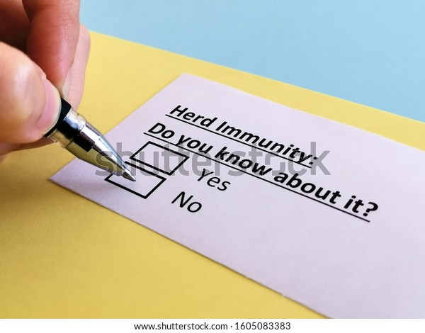 A person is answering question relating to herd immunity. 