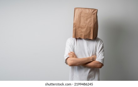 person with blank paper bag on head, mockup template