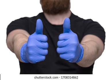 Person With Blue Latex Gloves For Protection Coronavirus With Thumbs Up, Covid-19 Self Isolation Or Quarantine At Home Support Doctors And Nurses Virus