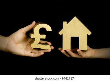 Person Buying A House With English Pounds, Black Background