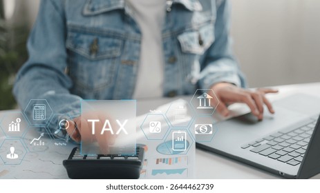 Person calculating tax on digital platform with financial icons overlay. Concept for online tax filing, business finance planning, digital accounting, percentage calculation, and modern financial tech