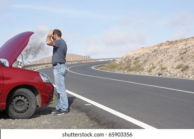 Person With Car Breakdown And Engine Trouble