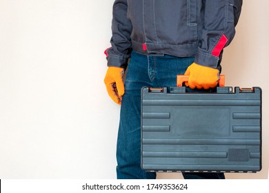 person with a case. master with tool box. Worker gear concept