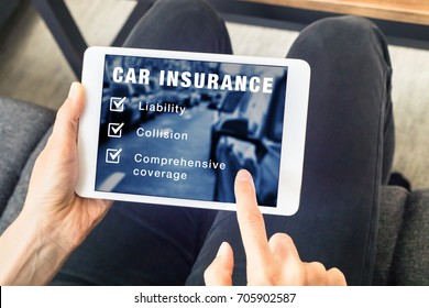 Person Choosing Car Insurance Coverage Options (liability, Collision, Comprehensive) On Website On Digital Tablet Computer Screen, Vehicle And Risk Protection