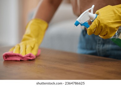 Person, cleaning and table with gloves, spray and closeup by maintenance, housekeeping and detergent for bacteria. Hands, cloth and fresh for service, cleaner and home by chemical, furniture and dust - Shutterstock ID 2364786625