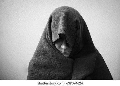 person covered in blanket